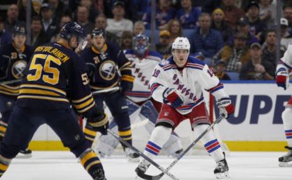 Dec 1, 2016; Buffalo, NY, USA; New York Rangers right wing Jesper Fast (19) watches as Buffalo Sabres defenseman Rasmus Ristolainen (55) looks to take a shot during the third period at KeyBank Center. Sabres beat the Rangers 4 to 3. Mandatory Credit: Timothy T. Ludwig-USA TODAY Sports