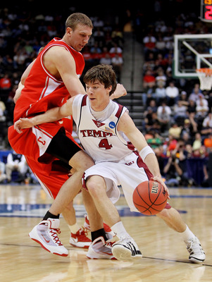 JACKSONVILLE, FL - MARCH 19: Juan Fernandez #4 of the Temple Owls drives around Jeff Foote #1 of the Cornell Big Red during the first round of the 2010 NCAA men's basketball tournament at Jacksonville Veteran's Memorial Arena on March 19, 2010 in Jackson