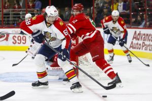 Dec 18, 2015; Raleigh, NC, USA; Florida Panthers forward Jaromir Jagr (68) controls the puck in front of Carolina Hurricanes forward Eric Staal (12) during the first period at PNC Arena. Mandatory Credit: James Guillory-USA TODAY Sports