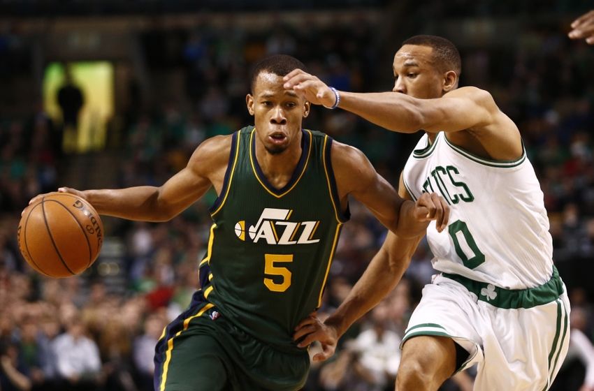 Feb 29, 2016; Boston, MA, USA; Utah Jazz guard Rodney Hood (5) drives to the basket against Boston Celtics guard Avery Bradley (0) during the second half at TD Garden. Mandatory Credit: Mark L. Baer-USA TODAY Sports