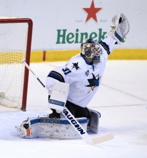 Feb 18, 2016; Sunrise, FL, USA; San Jose Sharks goalie Martin Jones (31) makes a save in the first period against the Florida Panthers at BB&T Center. Mandatory Credit: Robert Mayer-USA TODAY Sports