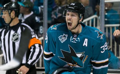 Apr 29, 2016; San Jose, CA, USA; San Jose Sharks center Logan Couture (39) celebrates after scoring a goal against the Nashville Predators in the third period in game one of the second round of the 2016 Stanley Cup Playoffs at SAP Center at San Jose. The Sharks won 5-2. Mandatory Credit: John Hefti-USA TODAY Sports
