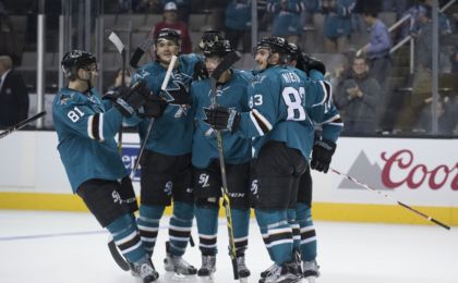 September 27, 2016; San Jose, CA, USA; San Jose Sharks forward Kevin Labanc (62) is congratulated for scoring the game-winning goal in overtime during a preseason hockey game against the Vancouver Canucks at SAP Center at San Jose. Mandatory Credit: Kyle Terada-USA TODAY Sports