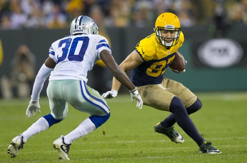 Oct 16, 2016; Green Bay, WI, USA; Green Bay Packers wide receiver Jordy Nelson (87) carries the ball as Dallas Cowboys defensive back Anthony Brown (30) defends during the fourth quarter at Lambeau Field. The Cowboys won 30-16. Mandatory Credit: Jeff Hanisch-USA TODAY Sports