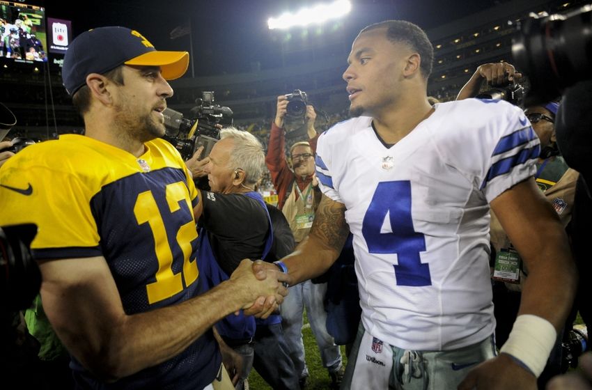 Oct 16, 2016; Green Bay, WI, USA; Green Bay Packers quarterback Aaron Rodgers (12) and Dallas Cowboys quarterback Dak Prescott (4) shake hands after thier game at Lambeau Field. Mandatory Credit: Benny Sieu-USA TODAY Sports