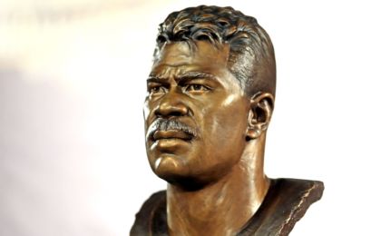 Aug 8, 2015, Canton, OH, USA; Detailed view of the bust of Junior Seau at the 2015 Pro Football Enshrinement Cermony at Tom Benson Hall of Fame Stadium. Mandatory Credit: Andrew Weber-USA TODAY Sports 