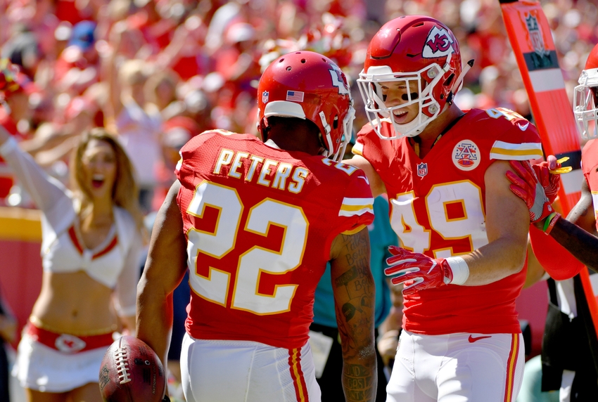 Aug 13, 2016; Kansas City, MO, USA; Kansas City Chiefs cornerback Marcus Peters (22) is congratulated by defensive back Daniel Sorensen (49) after Peters