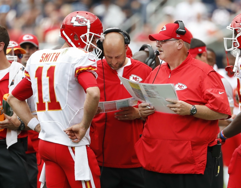 Aug 27, 2016; Chicago, IL, USA; Kansas City Chiefs quarterback Alex Smith (11) talks with head coach Andy Reid during a time out during the first half of the preseason game against the Chicago Bears at Soldier Field. Mandatory Credit: Kamil Krzaczynski-USA TODAY Sports