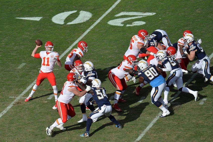 Jan 1, 2017; San Diego, CA, USA; Kansas City Chiefs quarterback Alex Smith (11) passes against the San Diego Chargers during the second quarter at Qualcomm Stadium. Mandatory Credit: Jake Roth-USA TODAY Sports