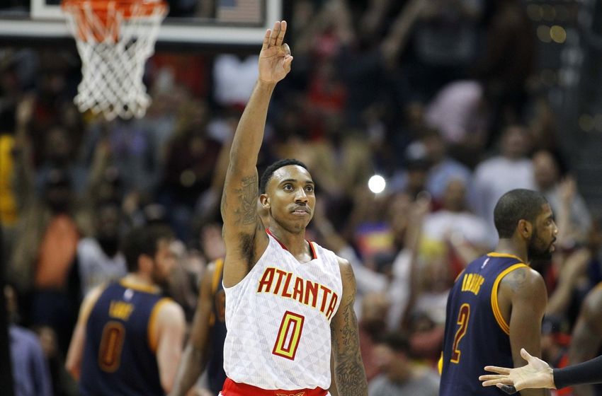 Apr 1, 2016; Atlanta, GA, USA; Atlanta Hawks guard Jeff Teague (0) celebrates a made three point basket against the Cleveland Cavaliers in the fourth quarter at Philips Arena. The Cavaliers defeated the Hawks 110-108 in overtime. Mandatory Credit: Brett Davis-USA TODAY Sports