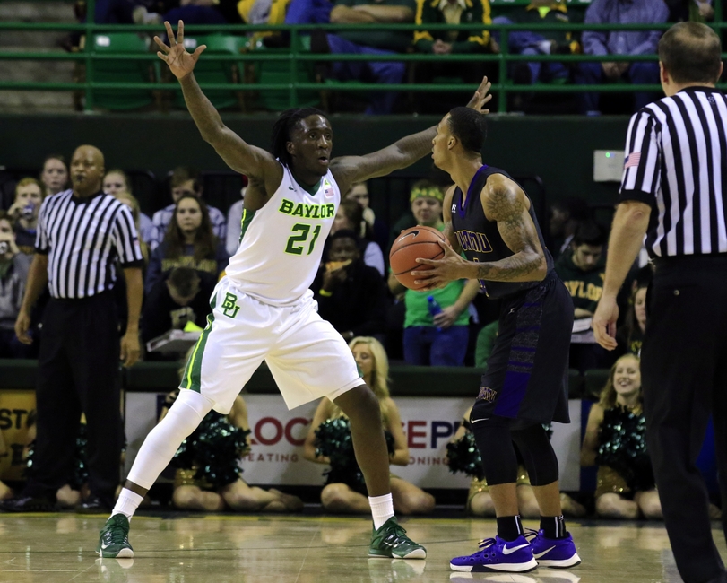 Dec 2, 2015; Waco, TX, USA; Baylor Bears forward Taurean Prince (21) guards Prairie View A&M Panthers guard Jayrn Johnson (1) during the first half at Ferrell Center. Mandatory Credit: Ray Carlin-USA TODAY Sports