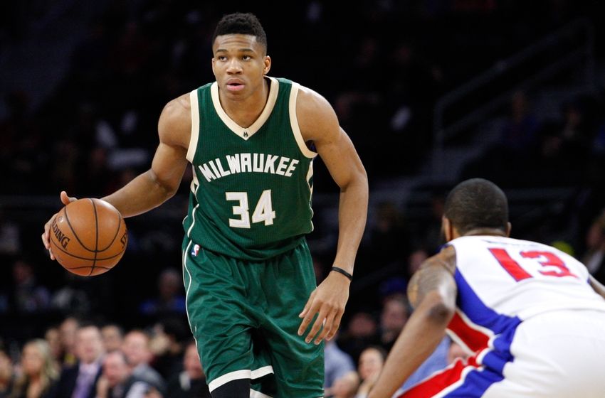 Mar 21, 2016; Auburn Hills, MI, USA; Milwaukee Bucks forward Giannis Antetokounmpo (34) gets defended by Detroit Pistons forward <a rel=