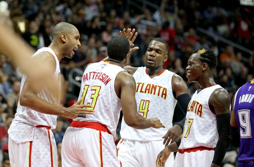 Nov 18, 2015; Atlanta, GA, USA; Atlanta Hawks guard Lamar Patterson (13) celebrates a play with center Al Horford (15, left), forward Paul Millsap (4), and guard Dennis Schroder (17) in the fourth quarter of their game against the Sacramento Kings at Philips Arena. The Hawks won 103-97. Mandatory Credit: Jason Getz-USA TODAY Sports