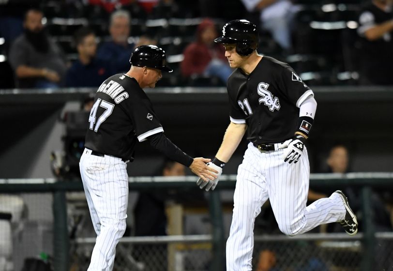 Sep 12, 2016; Chicago, IL, USA; Chicago White Sox third baseman Todd Frazier (right) celebrates his two run home run with third base coach Joe McEwing (left) against the Cleveland Indians during the eighth inning at U.S. Cellular Field. Mandatory Credit: Patrick Gorski-USA TODAY Sports