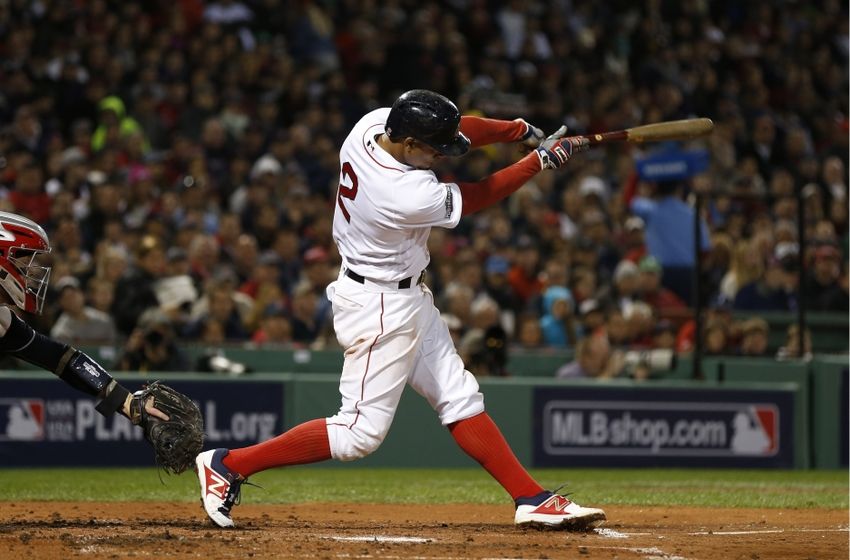 Oct 10, 2016; Boston, MA, USA; Boston Red Sox shortstop Xander Bogaerts (2) singles in the second inning against the Cleveland Indians during game three of the 2016 ALDS playoff baseball series at Fenway Park. Mandatory Credit: Greg M. Cooper-USA TODAY Sports