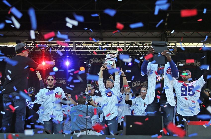 Nov 4, 2016; Chicago, IL, USA; Chicago Cubs starting pitcher Jon Lester (34) lifts the Commissioner