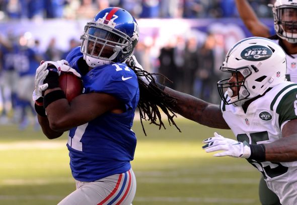 Dec 6, 2015; East Rutherford, NJ, USA; New York Giants wide receiver Dwayne Harris (17) returns a punt for touchdown against New York Jets tight end Jeff Cumberland (85) at MetLife Stadium. Mandatory Credit: Robert Deutsch-USA TODAY Sports