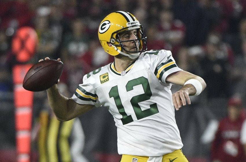 January 16, 2016; Glendale, AZ, USA; Green Bay Packers quarterback Aaron Rodgers (12) throws a pass against Arizona Cardinals during the first half in a NFC Divisional round playoff game at University of Phoenix Stadium. Mandatory Credit: Kyle Terada-USA TODAY Sports