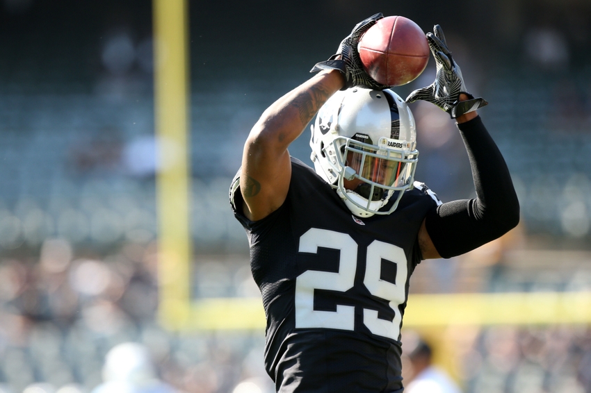 Oakland Raiders cornerback David Amerson (29) catches the ball before the start of the game against the Tennessee Titans at Oakland Alameda Coliseum.