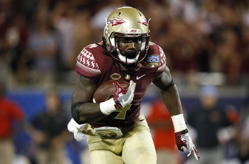 Sep 5, 2016; Orlando, FL, USA; Florida State Seminoles running back Dalvin Cook (4) runs the ball in the second quarter against the Mississippi Rebels at Camping World Stadium. Mandatory Credit: Logan Bowles-USA TODAY Sports