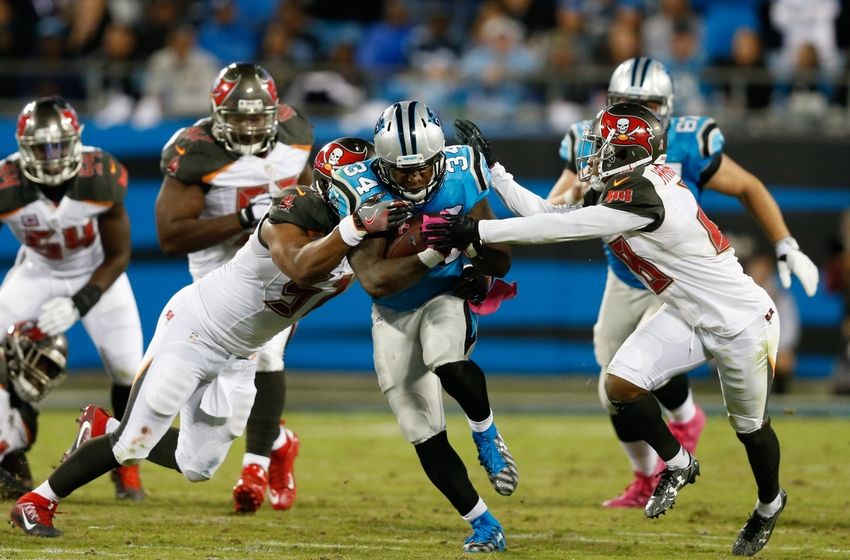 Oct 10, 2016; Charlotte, NC, USA; Carolina Panthers running back Cameron Artis-Payne (34) carries the ball during the third quarter against the Tampa Bay Buccaneers at Bank of America Stadium. The Buccaneers won 17-14. Mandatory Credit: Jeremy Brevard-USA TODAY Sports