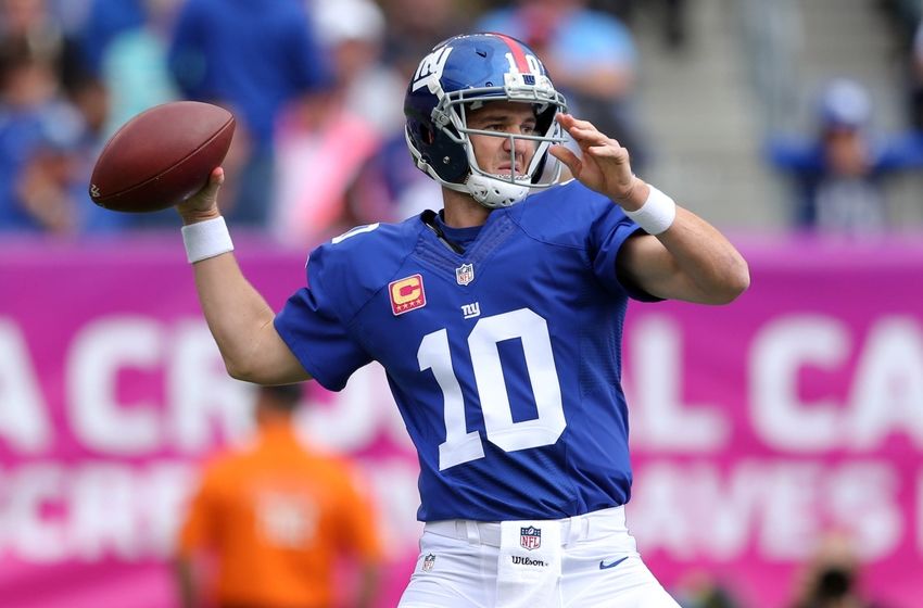 Oct 16, 2016; East Rutherford, NJ, USA; New York Giants quarterback Eli Manning (10) drops back to pass against the Baltimore Ravens during the first quarter at MetLife Stadium. Mandatory Credit: Brad Penner-USA TODAY Sports