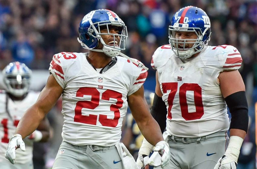 Oct 23, 2016; London, ENG; Running back Rashad Jennings (23) of the New York Giants celebrates his 4th quarter winning touchdown during the game between the Los Angeles Rams and the New York Giants at Twickenham Stadium. Mandatory Credit: Steve Flynn-USA TODAY Sports