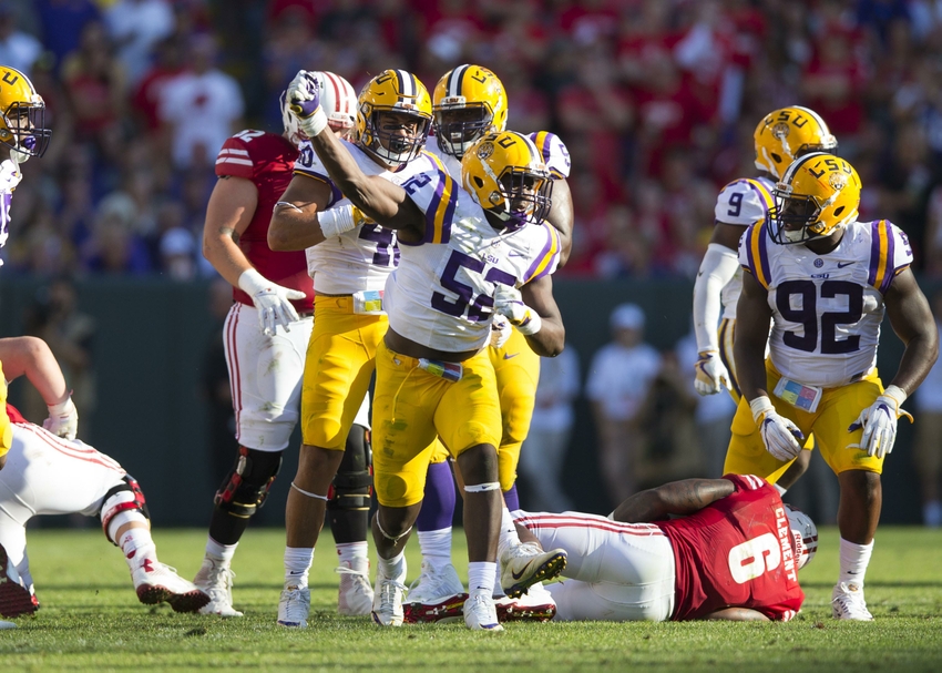 LSU Tigers linebacker Kendell Beckwith (52) celebrates following a play during the third quarter against the Wisconsin Badgers at Lambeau Field.