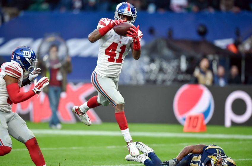 Oct 23, 2016; London, ENG; Cornerback Dominique Rodgers-Cromartie (41) of the New York Giants intercepts a 4 yard pass from quarterback Case Keenum (17) of the Los Angeles Rams during the fourth quarter of the game between the Los Angeles Rams and the New York Giants at Twickenham Stadium. Mandatory Credit: Steve Flynn-USA TODAY Sports