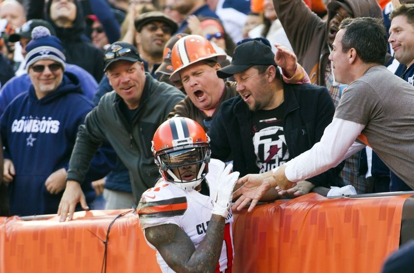 Nov 6, 2016; Cleveland, OH, USA; Cleveland Browns wide receiver Terrelle Pryor (11) leaps into the stands to celebrate his touchdown reception with fans against the Dallas Cowboys during the second quarter at FirstEnergy Stadium. Mandatory Credit: Scott R. Galvin-USA TODAY Sports