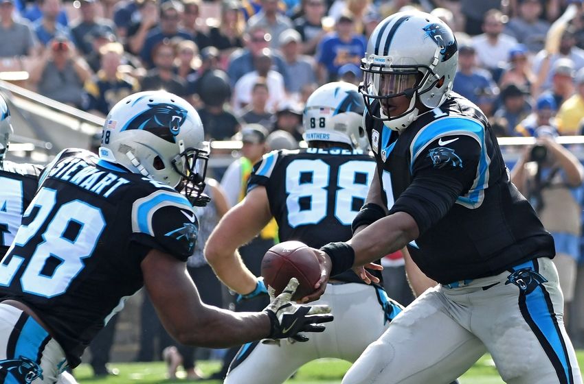 Nov 6, 2016; Los Angeles, CA, USA; Carolina Panthers quarterback Cam Newton (1) hands off to running back Jonathan Stewart (28) in the first half of the game against the Los Angeles Rams at the Los Angeles Memorial Coliseum. Mandatory Credit: Jayne Kamin-Oncea-USA TODAY Sports
