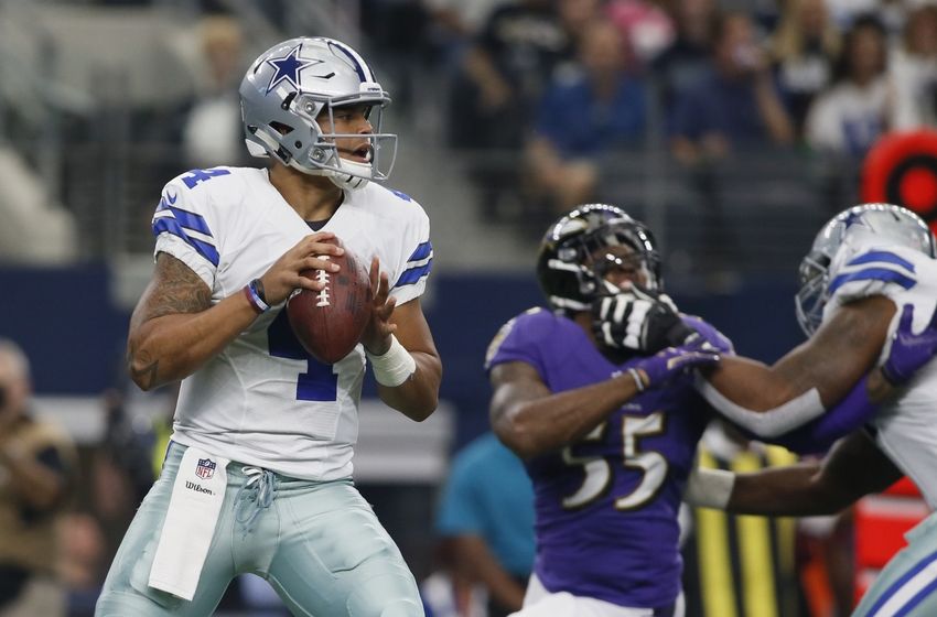 Nov 20, 2016; Arlington, TX, USA; Dallas Cowboys quarterback Dak Prescott (4) looks to throw from the pocket in the first quarter against the Baltimore Ravens at AT&T Stadium. Mandatory Credit: Tim Heitman-USA TODAY Sports