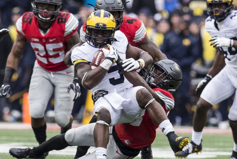 Nov 26, 2016; Columbus, OH, USA; Michigan Wolverines linebacker Jabrill Peppers (5) is tackled by Ohio State Buckeyes wide receiver Terry McLaurin (83) after an interception at Ohio Stadium. Ohio State won the game 30-27 in double overtime. Mandatory Credit: Greg Bartram-USA TODAY Sports