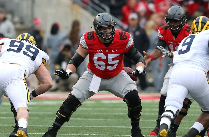 Nov 26, 2016; Columbus, OH, USA; Ohio State Buckeyes offensive lineman Pat Elflein (65) blocks during the second quarter against the Michigan Wolverines at Ohio Stadium. Ohio State won 30-27. Mandatory Credit: Joe Maiorana-USA TODAY Sports