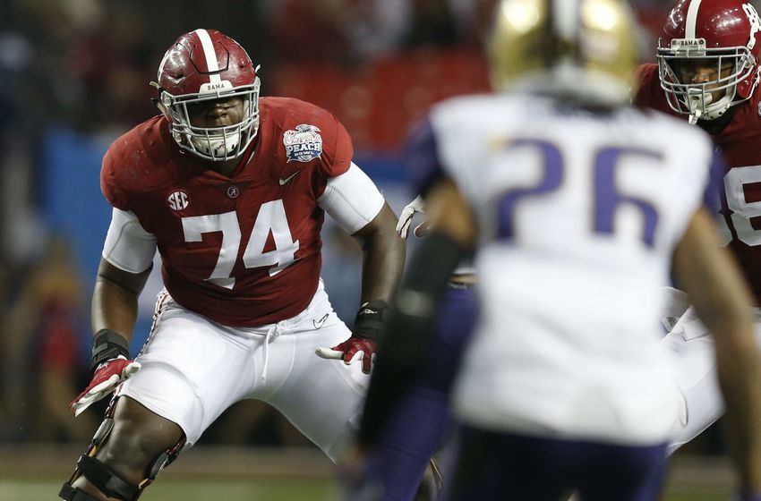 Dec 31, 2016; Atlanta, GA, USA; Alabama Crimson Tide offensive lineman Cam Robinson (74) works at the line of scrimmage during the third quarter in the 2016 CFP Semifinal Washington Huskies at the Georgia Dome. Mandatory Credit: Jason Getz-USA TODAY Sports