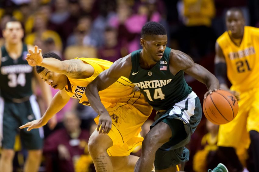 Jan 2, 2016; Minneapolis, MN, USA; Minnesota Gophers guard Nate Mason (2) and Michigan State Spartans guard Eron Harris (14) chase a loose ball in the second half Williams Arena. Mandatory Credit: Brad Rempel-USA TODAY Sports