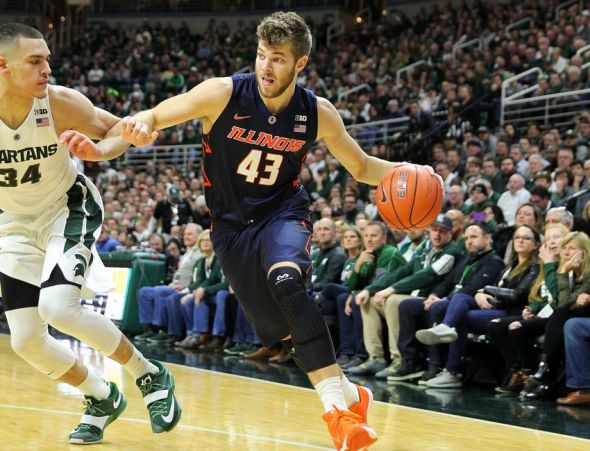 Jan 7, 2016; East Lansing, MI, USA; Illinois Fighting Illini forward Michael Finke (43) drives to the basket against Michigan State Spartans forward Gavin Schilling (34) during the 1st half of a game at Jack Breslin Student Events Center. Mandatory Credit: Mike Carter-USA TODAY Sports