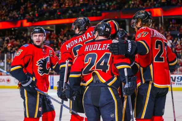 Feb 25, 2016; Calgary, Alberta, CAN; Calgary Flames left wing Jiri Hudler (24) celebrates his goal with teammates against the New York Islanders during the first period at Scotiabank Saddledome. Mandatory Credit: Sergei Belski-USA TODAY Sports