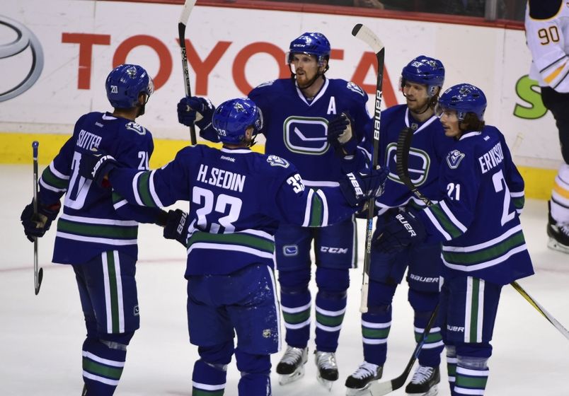 Oct 20, 2016; Vancouver, British Columbia, CAN; Vancouver Canucks forward Daniel Sedin (22) celebrates his goal against Buffalo Sabres goaltender Robin Lehner (40) during the third period at Rogers Arena. The Vancouver Canucks won 2-1. Mandatory Credit: Anne-Marie Sorvin-USA TODAY Sports