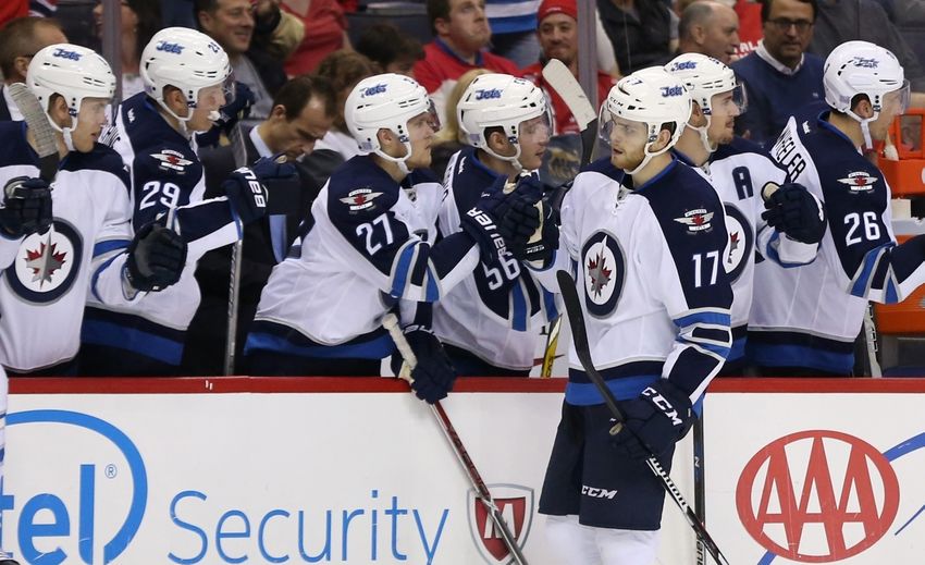 Nov 3, 2016; Washington, DC, USA; Winnipeg Jets center Adam Lowry (17) celebrates with teammates after scoring a goal against the Washington Capitals in the third period at Verizon Center. The Capitals won 4-3 in overtime. Mandatory Credit: Geoff Burke-USA TODAY Sports
