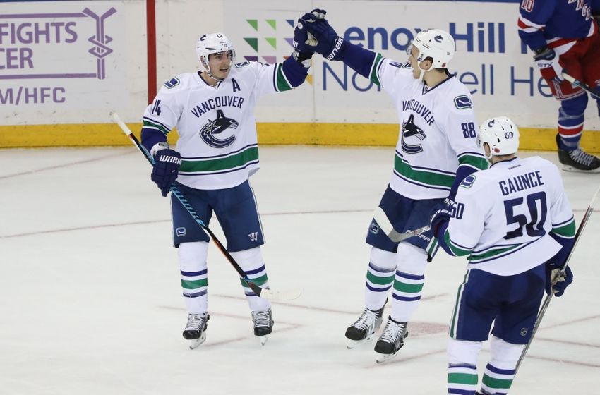 Nov 8, 2016; New York, NY, USA; Vancouver Canucks right wing Alexandre Burrows (14) celebrates scoring during the third period against the New York Rangers at Madison Square Garden. The Canucks won 5-3. Mandatory Credit: Anthony Gruppuso-USA TODAY Sports
