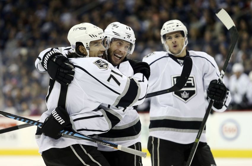 NHL Power Rankings: Los Angeles Kings defenseman Tom Gilbert (14) celebrates his goal with center Jordan Nolan (71) during the third period against the Winnipeg Jets at MTS Centre. Winnipeg wins in an overtime shootout 3-2. Mandatory Credit: Bruce Fedyck-USA TODAY Sports