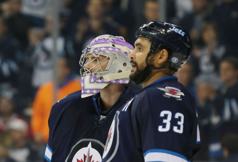 NHL Power Rankings: Winnipeg Jets goalie Connor Hellebuyck (37) celebrates his shutout and win over the Chicago Blackhawks after the third period at MTS Centre. Winnipeg won 4-0. Mandatory Credit: Bruce Fedyck-USA TODAY Sports