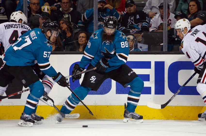 Nov 23, 2016; San Jose, CA, USA; San Jose Sharks defenseman Brent Burns (88) takes control of the puck during the game against the Chicago Blackhawks in the third period at SAP Center at San Jose. The San Jose Sharks defeated the Chicago Blackhawks with a score of 2-1. Mandatory Credit: Stan Szeto-USA TODAY Sports