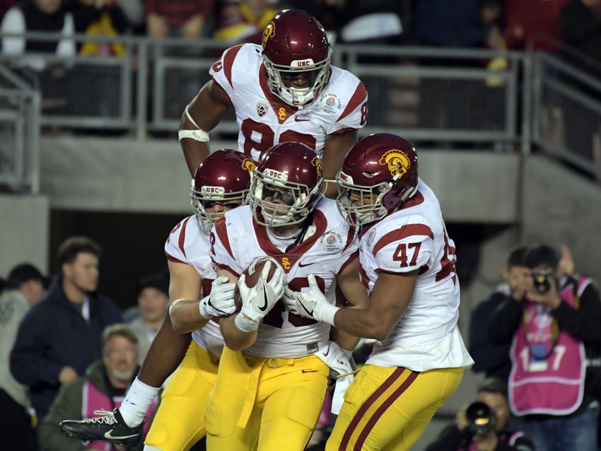 Jan 2, 2017; Pasadena, CA, USA; USC Trojans tight end Taylor McNamara (48) celebrates making a touchdown with fullback Reuben Peters (47) and tight end Daniel Imatorbhebhe (88) during the third quarter of the 2017 Rose Bowl game against the Penn State Nittany Lions at Rose Bowl. Mandatory Credit: Kirby Lee-USA TODAY Sports