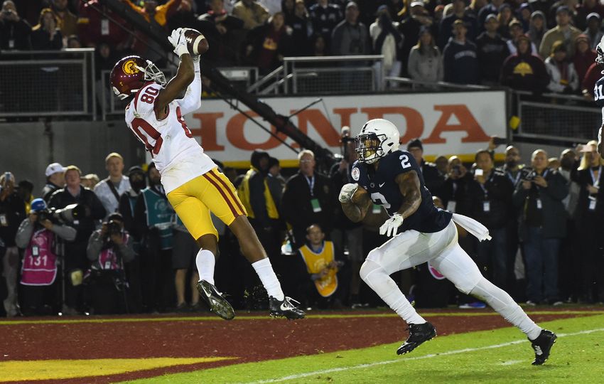 Jan 2, 2017; Pasadena, CA, USA; USC Trojans wide receiver Deontay Burnett (80) makes a catch for a touchdown against Penn State Nittany Lions safety Marcus Allen (2) during the fourth quarter of the 2017 Rose Bowl game at Rose Bowl. Mandatory Credit: Jayne Kamin-Oncea-USA TODAY Sports