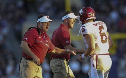 Oct 1, 2016; Fort Worth, TX, USA; Oklahoma Sooners head coach Bob Stoops and quarterback Baker Mayfield (6) and offensive coordinator Lincoln Riley celebrate during the game against the TCU Horned Frogs at Amon G. Carter Stadium. Mandatory Credit: Kevin Jairaj-USA TODAY Sports