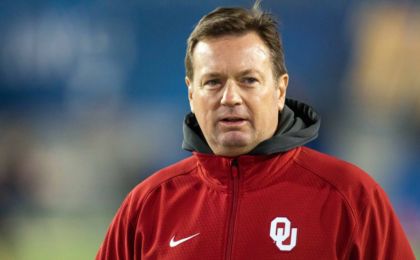 Nov 19, 2016; Morgantown, WV, USA; Oklahoma Sooners head coach Bob Stoops walks the field prior to their game against the West Virginia Mountaineers at Milan Puskar Stadium. Mandatory Credit: Ben Queen-USA TODAY Sports