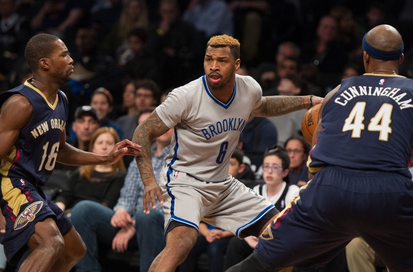 Apr 3, 2016; Brooklyn, NY, USA; New Orleans Pelicans forward Dante Cunningham (44) and New Orleans Pelicans guard Toney Douglas (16) guard Brooklyn Nets guard Sean Kilpatrick (6) in the second half at Barclays Center. Pelicans defeat the Nets 106-87. Mandatory Credit: William Hauser-USA TODAY Sports