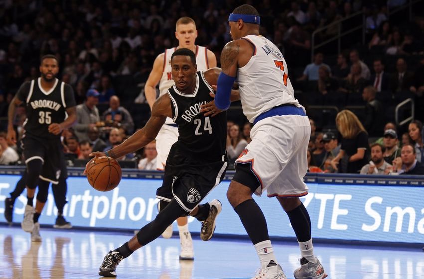 Oct 8, 2016; New York, NY, USA; Brooklyn Nets guard Rondae Hollis-Jefferson (24) drives to the basket past New York Knicks forward Carmelo Anthony (7) during the second half at Madison Square Garden. Mandatory Credit: Adam Hunger-USA TODAY Sports